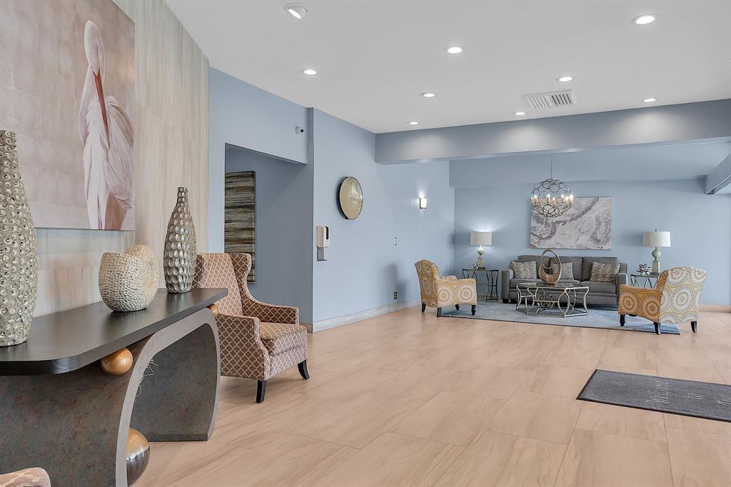 1200 Hibiscus Avenue, Unit 1106 Pompano Beach, FL 33062 - Photo 14 of 19 a living room with furniture