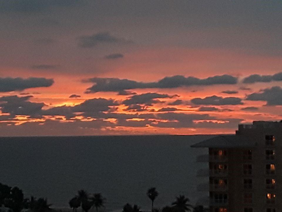 1200 Hibiscus Avenue, Unit 1106 Pompano Beach, FL 33062 - Photo 2 of 19 a view of sunset