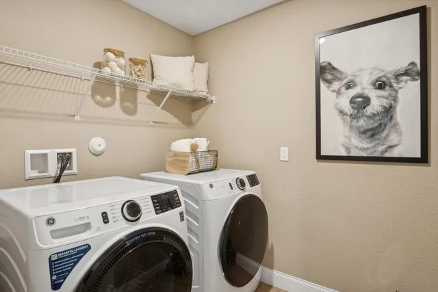 a utility room with dryer and washer