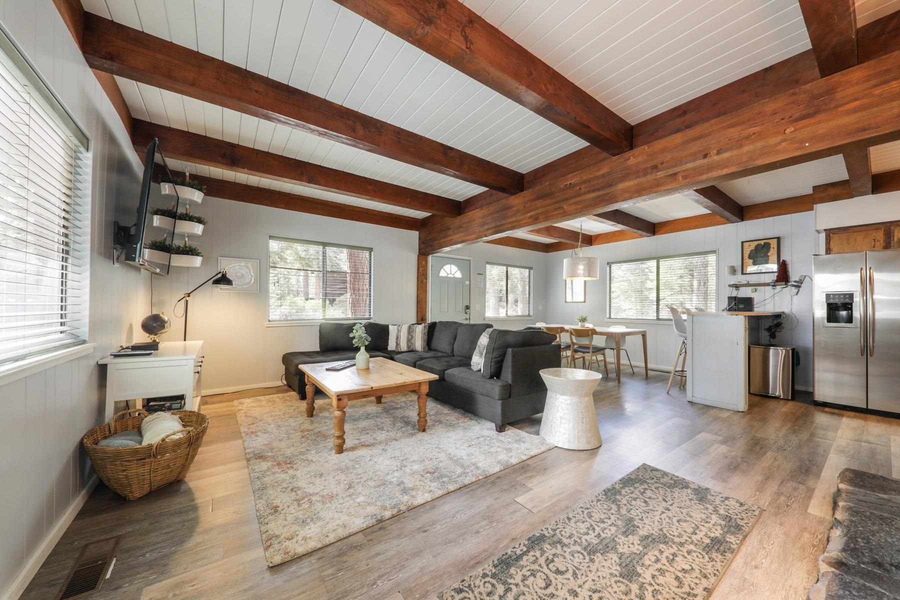 5656 Victoria Road Carnelian Bay, CA 96140 - Photo 10 of 28 a living room with furniture and kitchen view