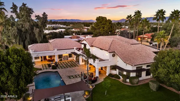 a aerial view of a house with a garden and plants