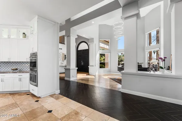a work room with furniture and wooden floor