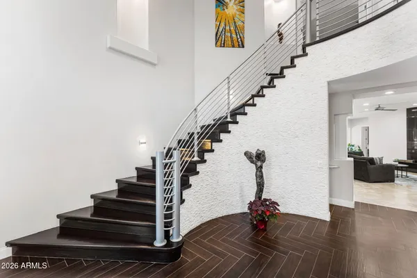 a large bathroom with a large tub and sink