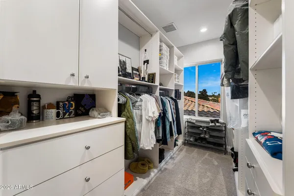 a utility room with sink dryer and washer