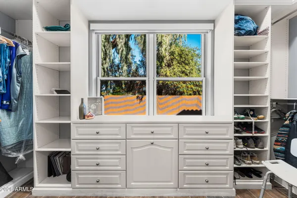 a view of a house with outdoor space and sitting area