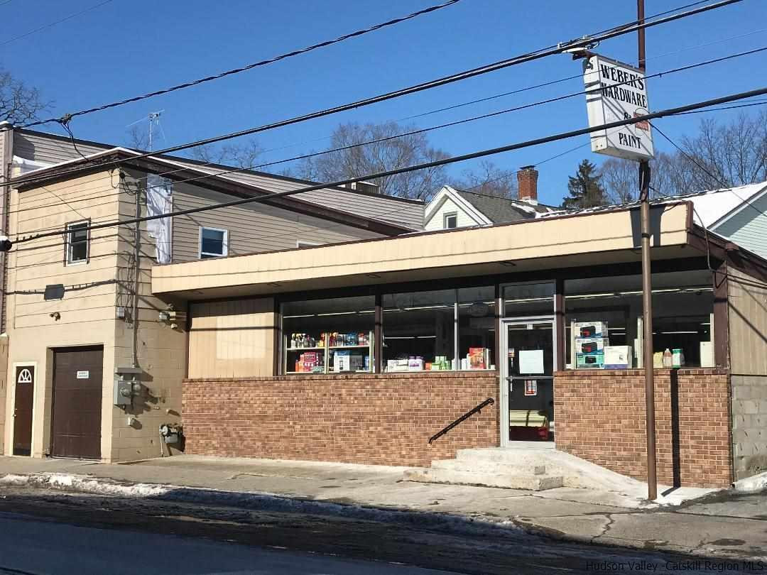 a view of house with a street