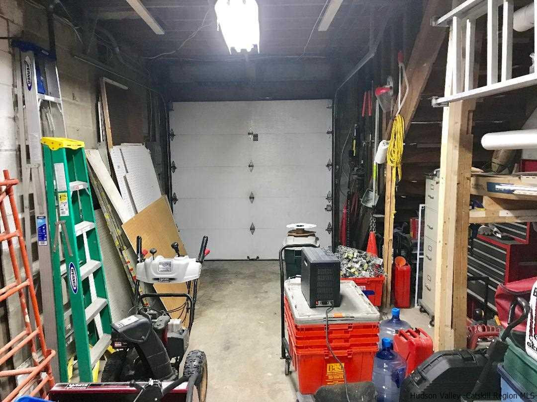 22 Wallkill Avenue Wallkill, NY 12589 - Photo 12 of 26 a living room with furniture and a rug