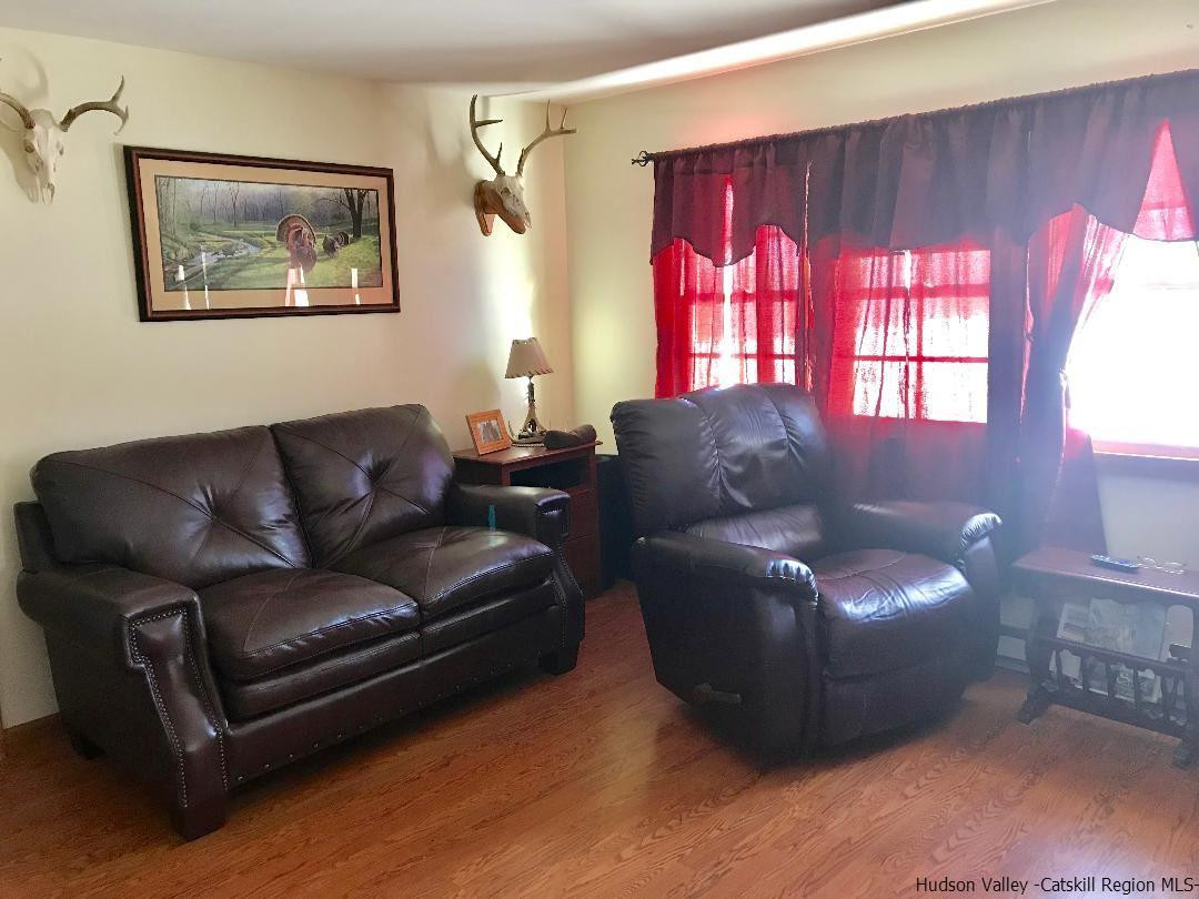 22 Wallkill Avenue Wallkill, NY 12589 - Photo 16 of 26 a living room with furniture and a window