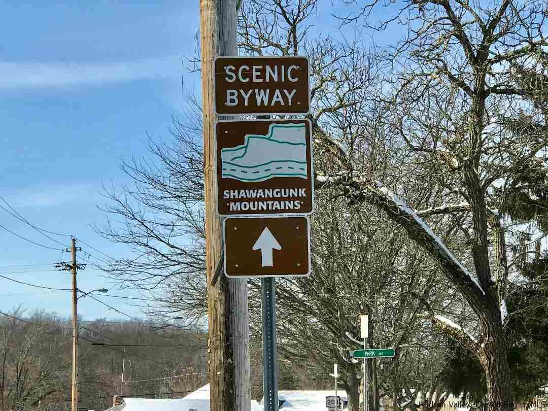 22 Wallkill Avenue Wallkill, NY 12589 - Photo 25 of 26 a sign on the side of a building