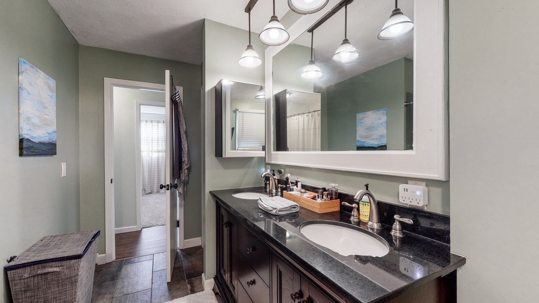 7306 Liberty Road Fairview, TN 37062 - Photo 13 of 19 a bathroom with a sink vanity granite and a mirror