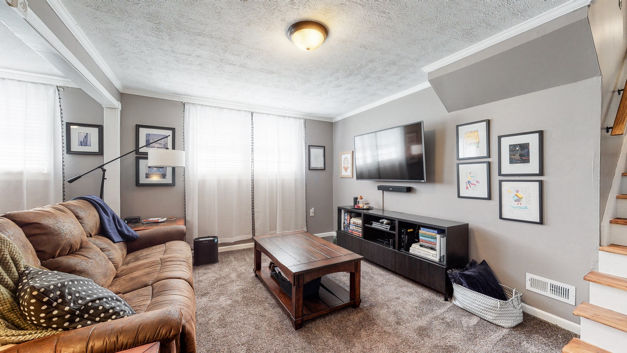 7306 Liberty Road Fairview, TN 37062 - Photo 17 of 19 a living room with furniture and a flat screen tv