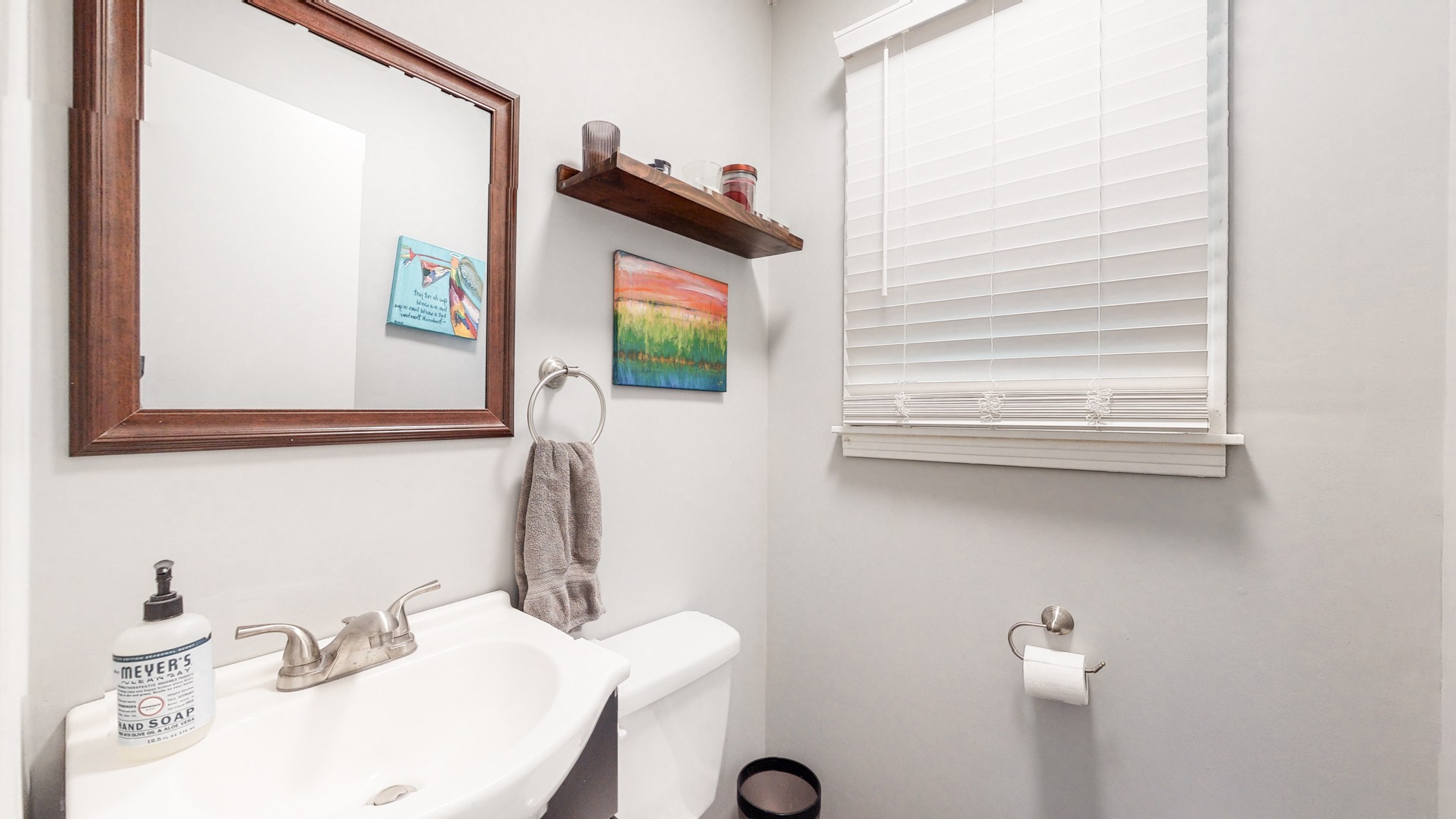 7306 Liberty Road Fairview, TN 37062 - Photo 19 of 19 a bathroom with a sink and a mirror