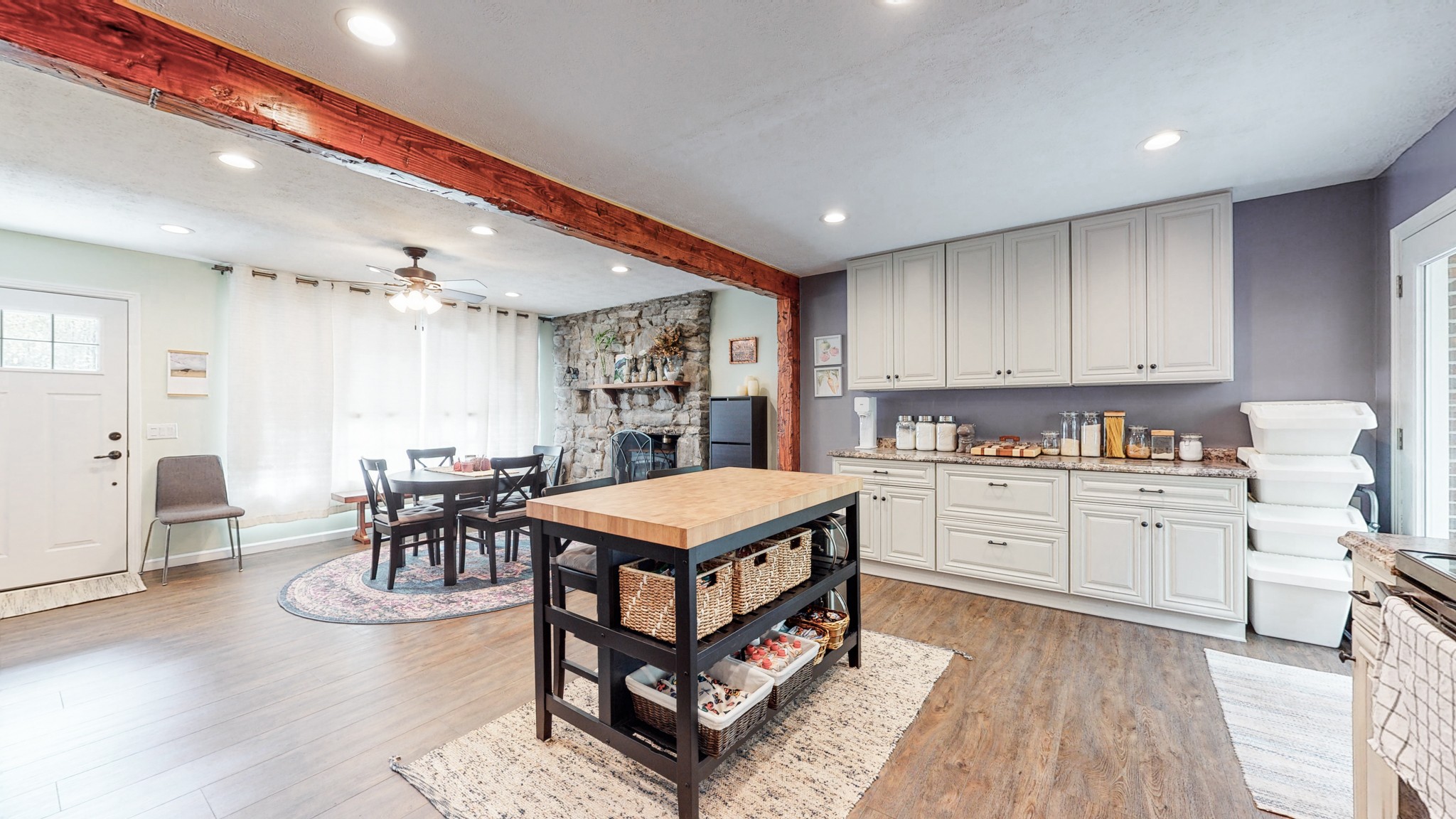 7306 Liberty Road Fairview, TN 37062 - Photo 9 of 19 a kitchen with cabinets table and chairs