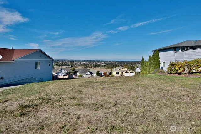 a view of houses with outdoor space
