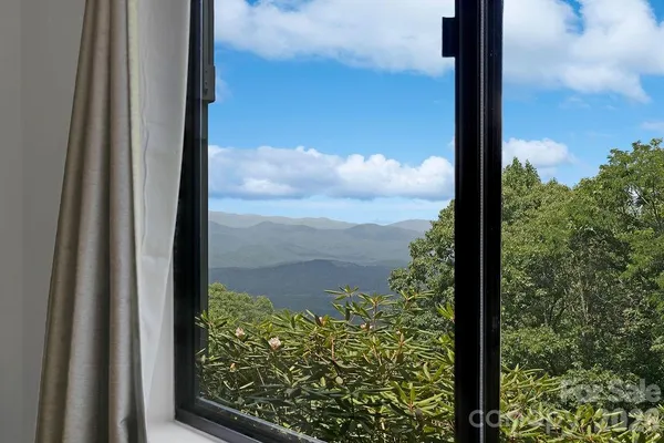 a view of a lake from a window