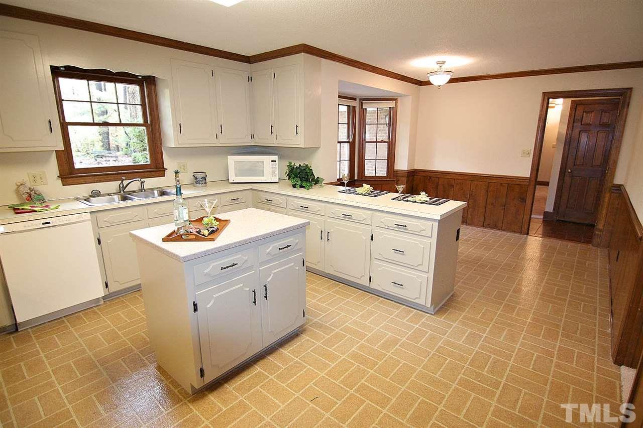 2816 Mattlyn Court Raleigh, NC 27613 - Photo 11 of 25 Kitchen has an Incredible Amount of Counter Space + Center Island