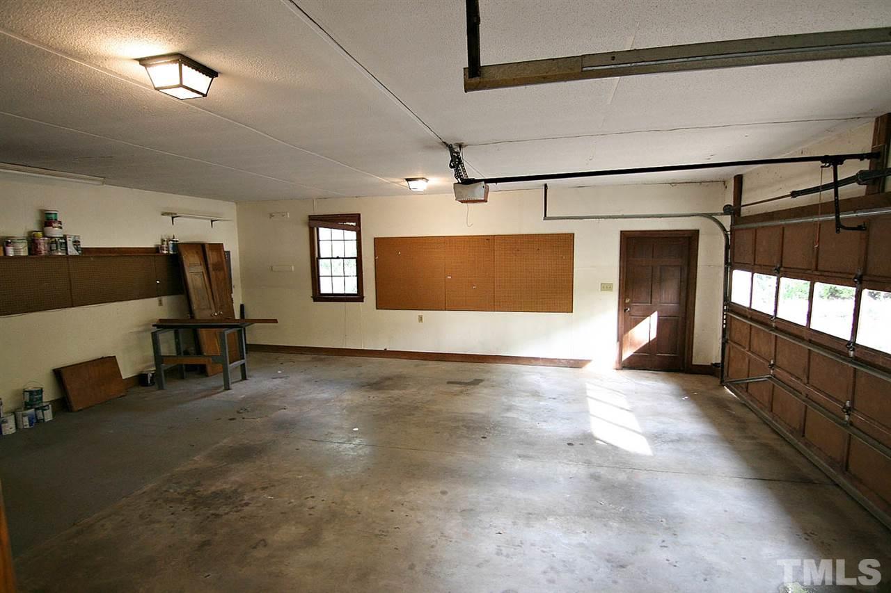 2816 Mattlyn Court Raleigh, NC 27613 - Photo 20 of 25 Oversized -- 26x24 Garage -- plenty of room for a Workshop. There is a Walk-thru Service Door.