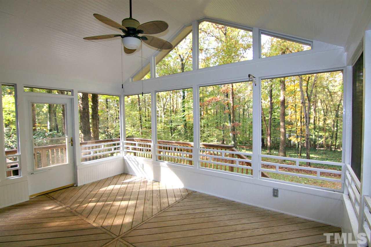 2816 Mattlyn Court Raleigh, NC 27613 - Photo 3 of 25 Enjoy Relaxing on the Screened Porch and the Tranquility of a Park-like Setting