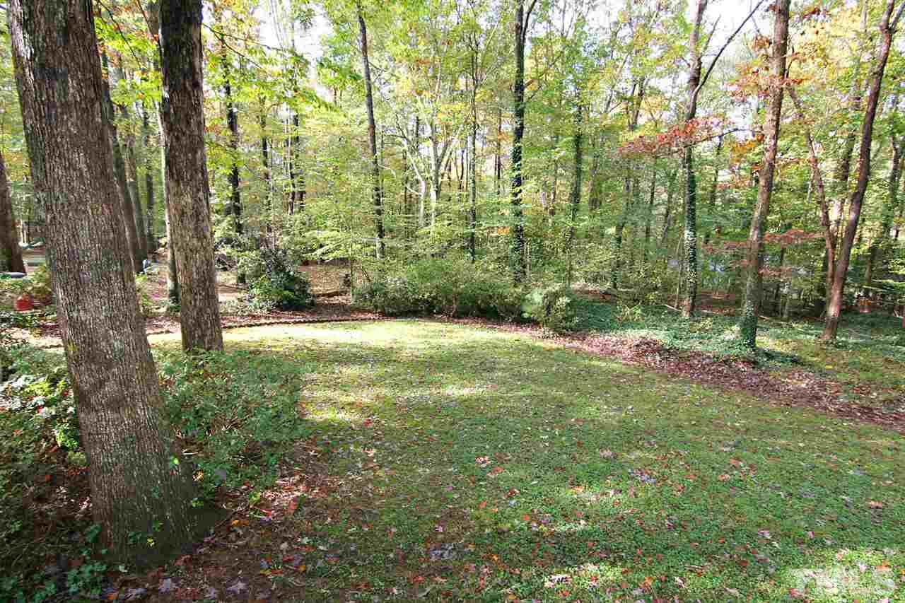 2816 Mattlyn Court Raleigh, NC 27613 - Photo 25 of 25 Amazing Backyard has Mature Trees and Landscaping