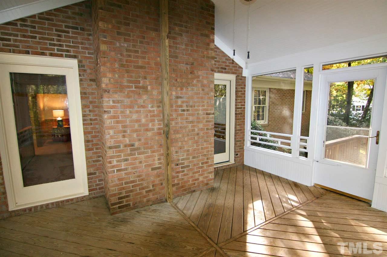 2816 Mattlyn Court Raleigh, NC 27613 - Photo 4 of 25 The Screened Porch is accessed from the Living Room.