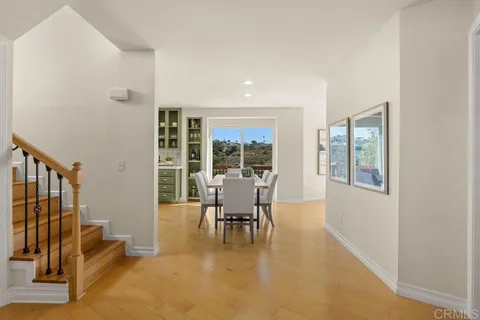 a kitchen with stainless steel appliances a stove a refrigerator and a sink