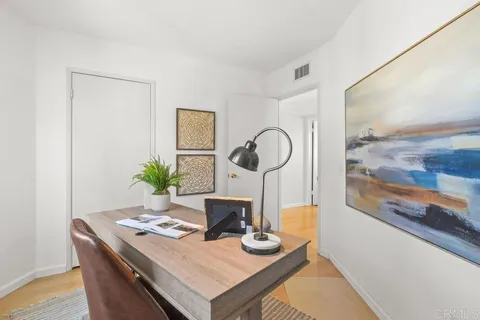 a bathroom with a tub and shower