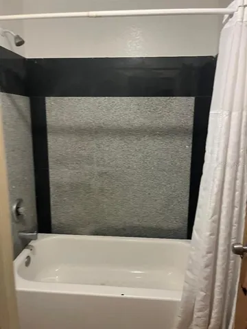 a bathroom with a bathtub