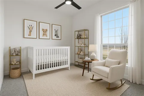 a bedroom with furniture and a window