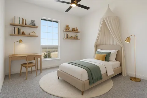 a bedroom with a bed and a chair