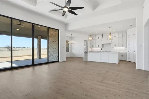 a view of a big room with a large window