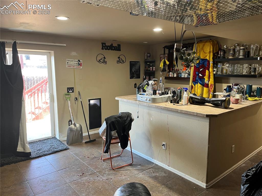 7860 Gladwater Road Peyton, CO 80831 - Photo 19 of 22 a view of a room with gym equipment