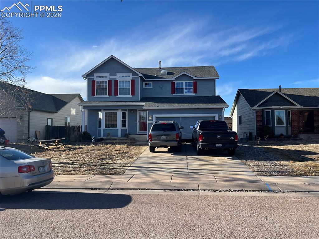 7860 Gladwater Road Peyton, CO 80831 - Photo 2 of 22 a view of a house with a street