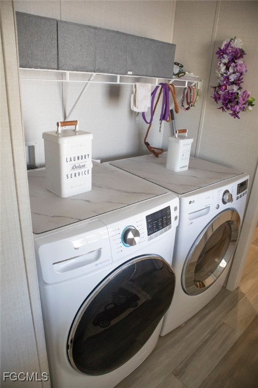 720 North Estribo Street Clewiston, FL 33440 - Photo 12 of 39 a utility room with dryer and washer