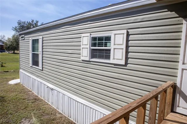 a view of a house with a large window
