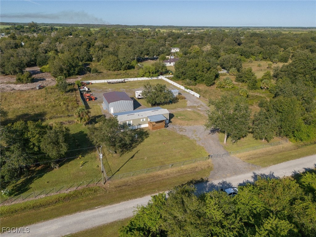 720 North Estribo Street Clewiston, FL 33440 - Photo 28 of 39 an aerial view of residential houses with outdoor space