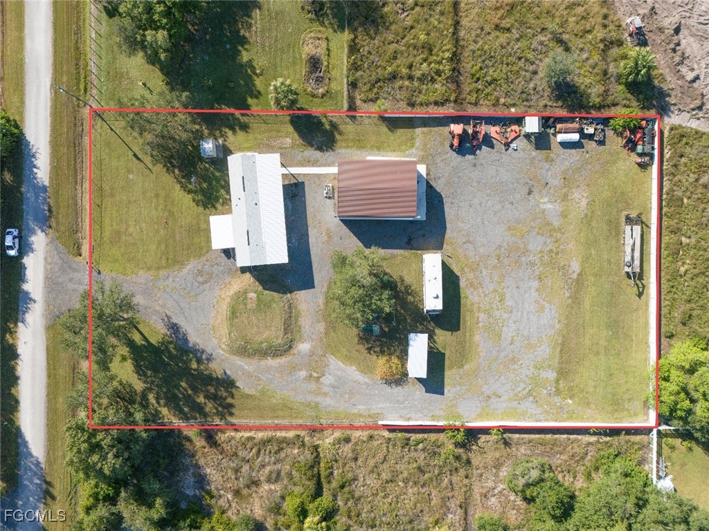 720 North Estribo Street Clewiston, FL 33440 - Photo 33 of 39 aerial view of a house with a yard