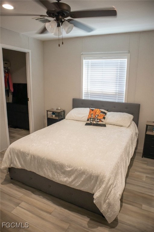 720 North Estribo Street Clewiston, FL 33440 - Photo 9 of 39 a bedroom with a bed and a window