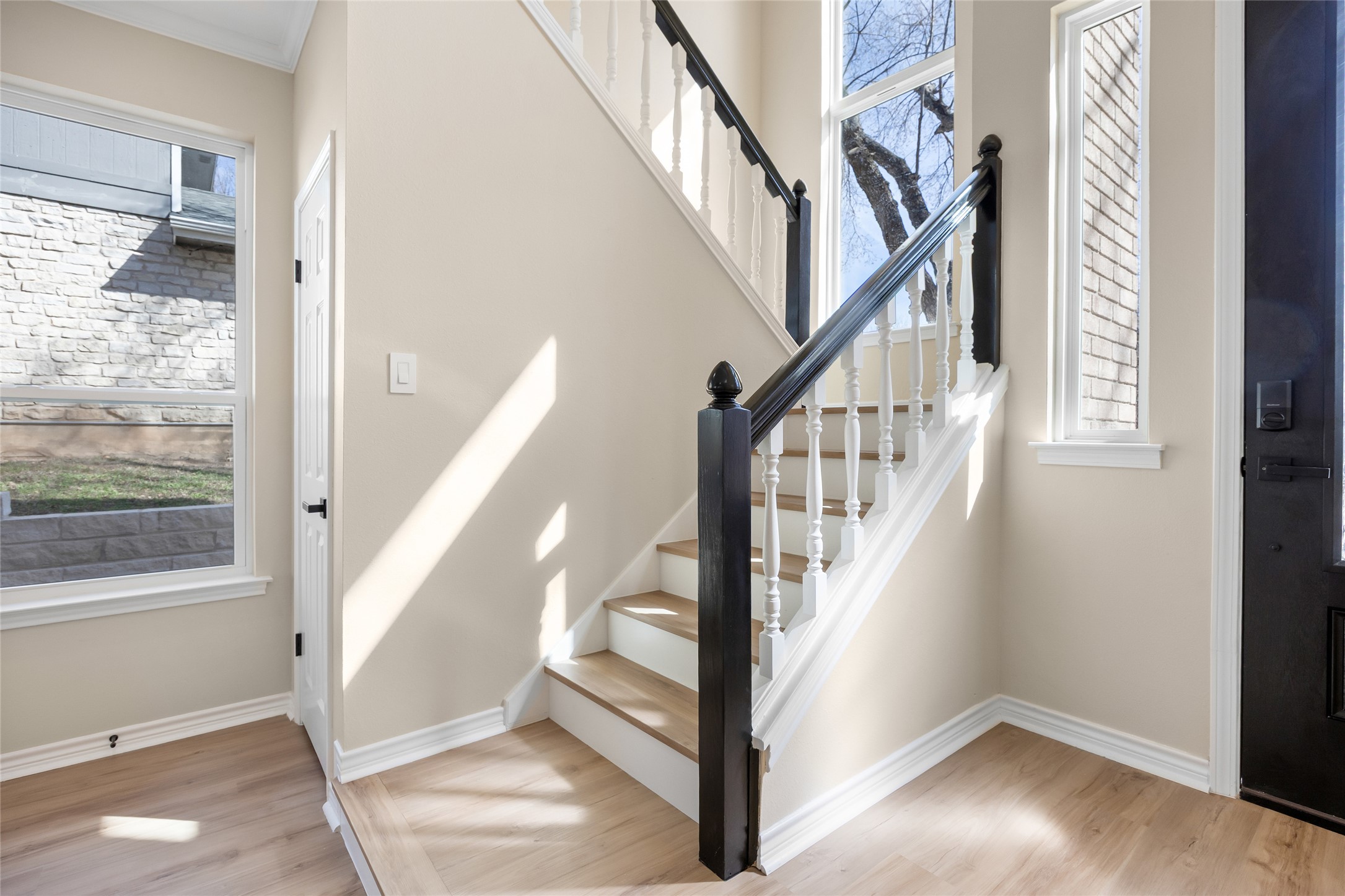 1002 Crestview Street Round Rock, TX 78681 - Photo 20 of 40 Entrance foyer featuring light wood-style flooring