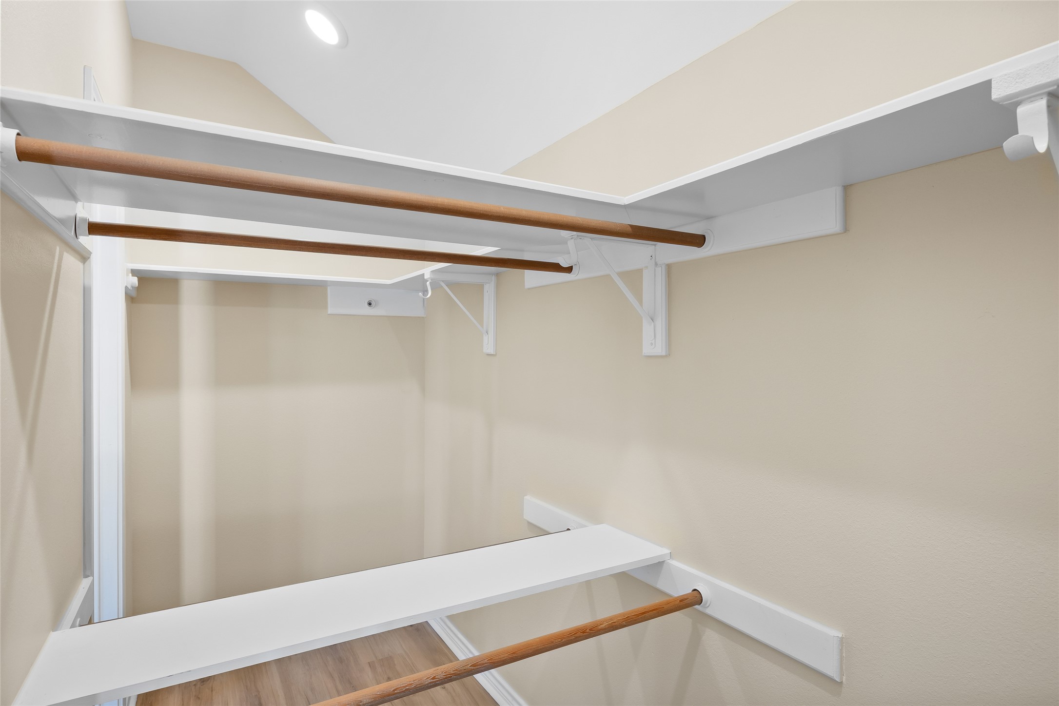 1002 Crestview Street Round Rock, TX 78681 - Photo 24 of 40 Walk in closet featuring wood finished floors