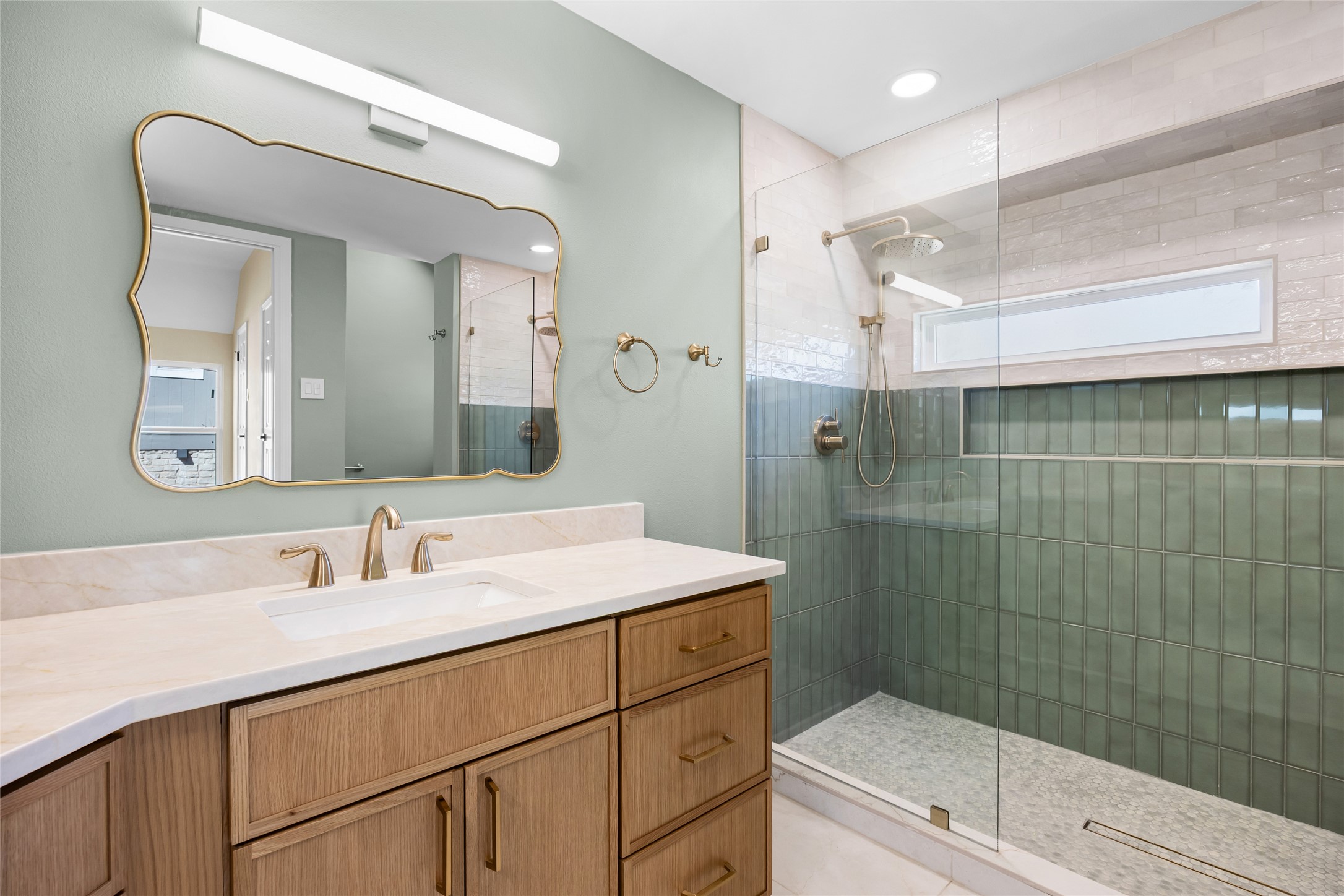 1002 Crestview Street Round Rock, TX 78681 - Photo 25 of 40 Full bath featuring a walk in shower, vanity, and recessed lighting