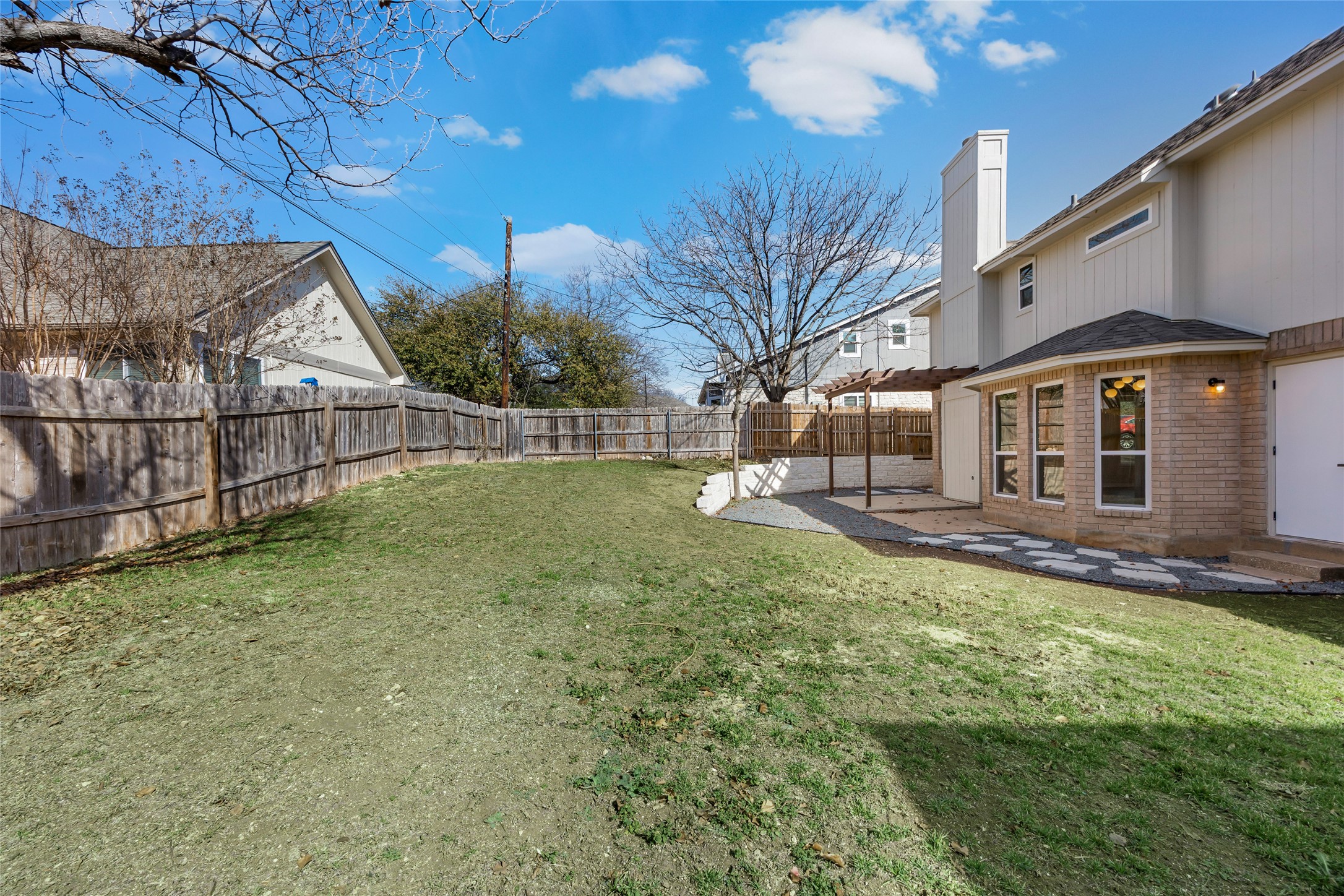 1002 Crestview Street Round Rock, TX 78681 - Photo 37 of 40 Fenced backyard featuring a patio area