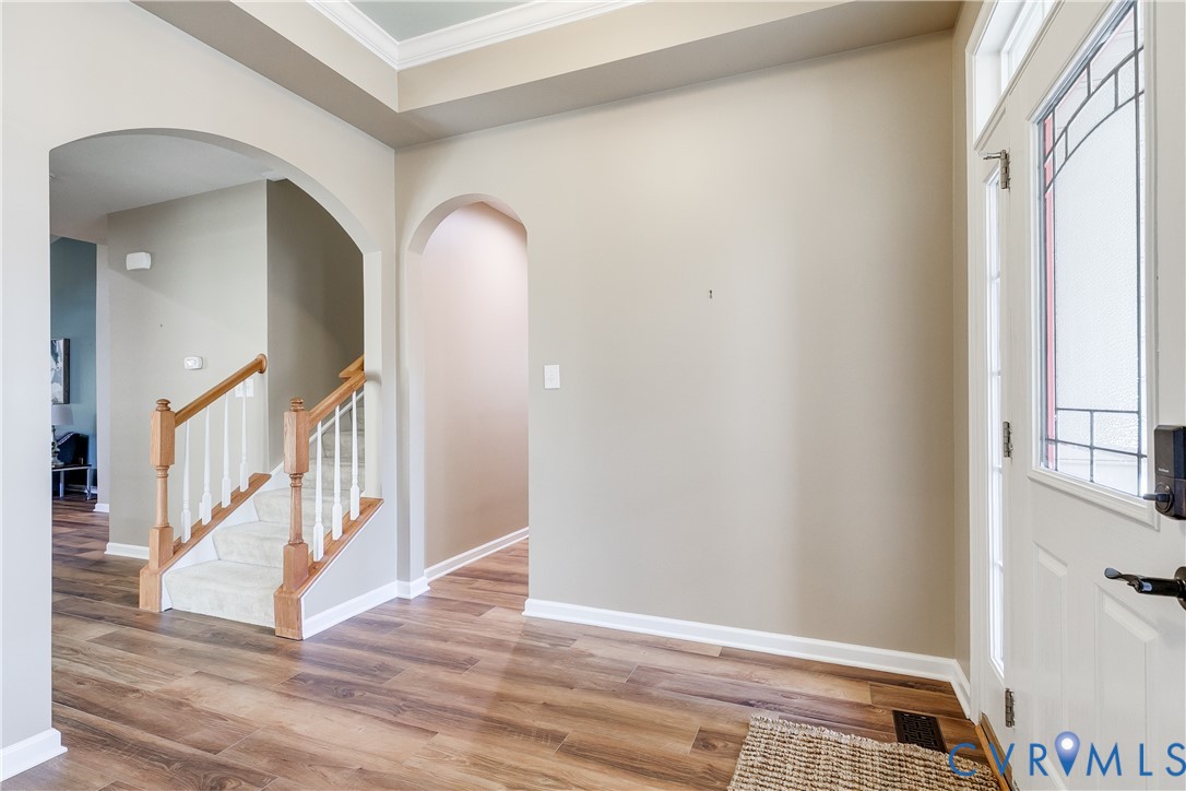 7538 South Franklins Way Quinton, VA 23141 - Photo 5 of 48 a view of entryway and hall with wooden floor