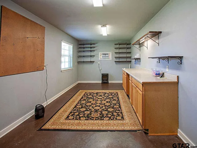 a view of a chairs and table in the garden