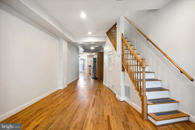 a view of entryway with wooden floor