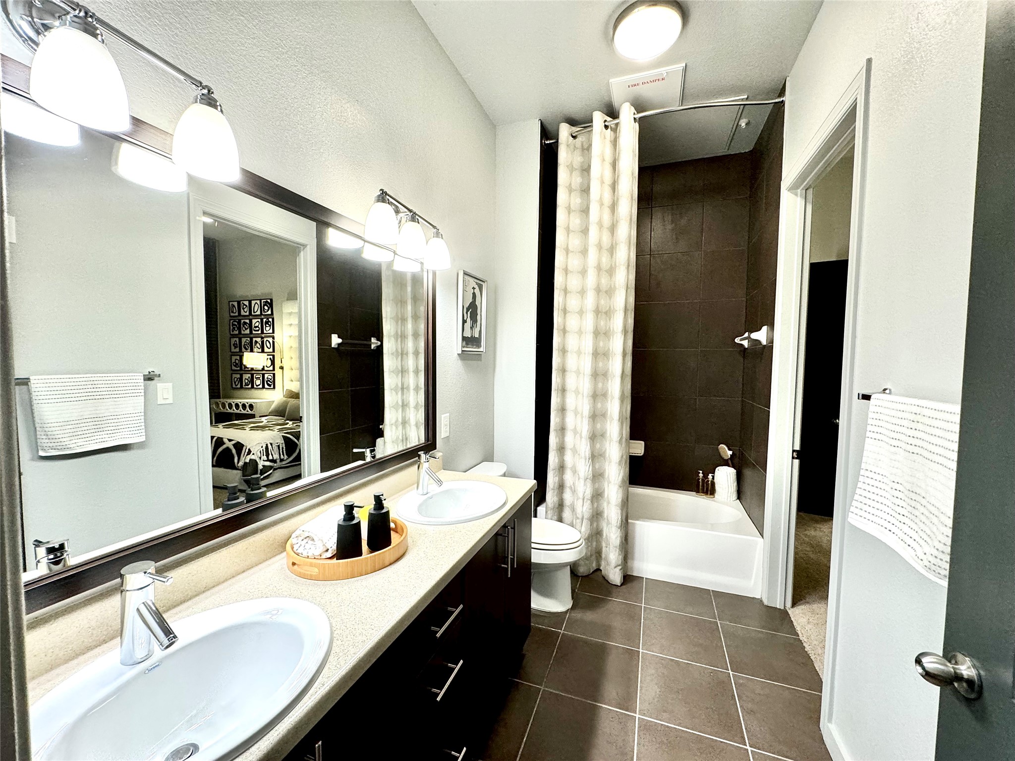 2525 McCue Road, Unit 249 Houston, TX 77056 - Photo 5 of 13 a bathroom with a sink and a mirror