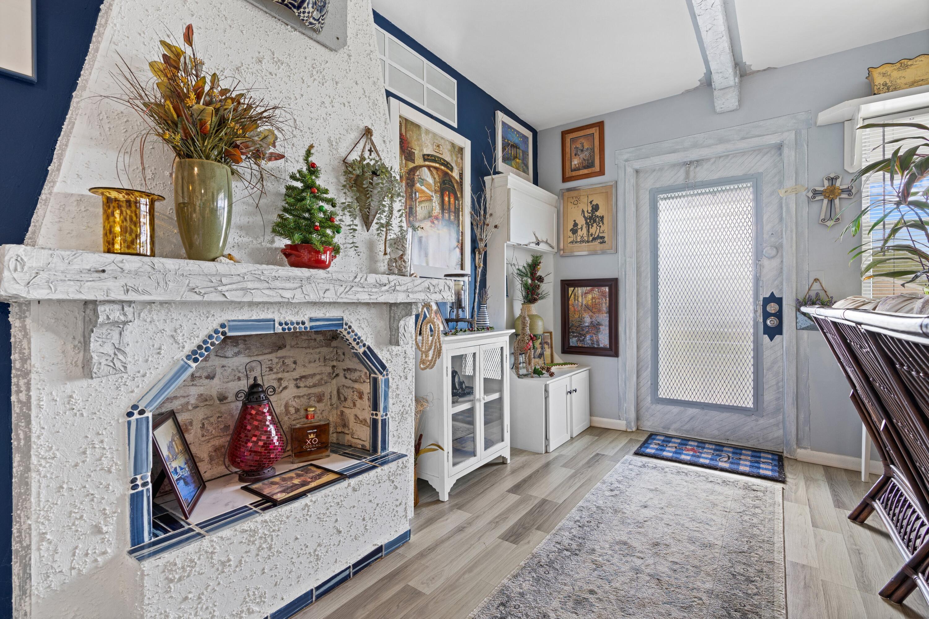 391 Tilford R Deerfield Beach, FL 33442 - Photo 11 of 30 Entry with Faux Fireplace