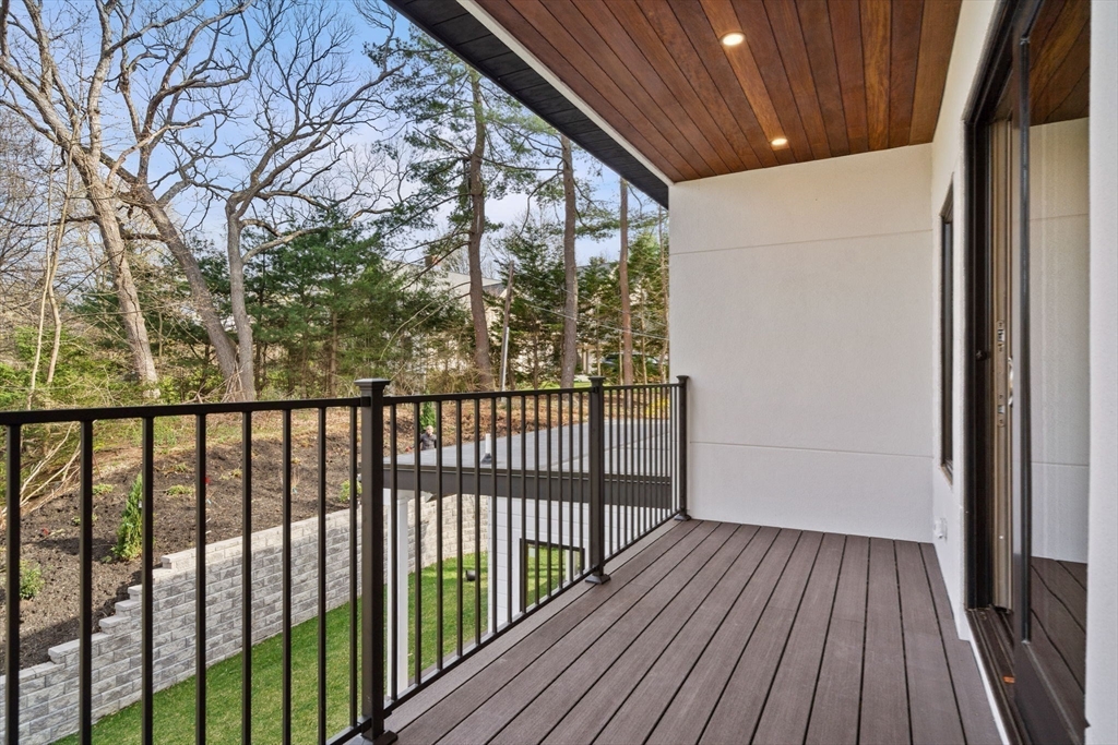 56 Upland Road Newton, MA 02468 - Photo 20 of 41 a view of a balcony with wooden floor