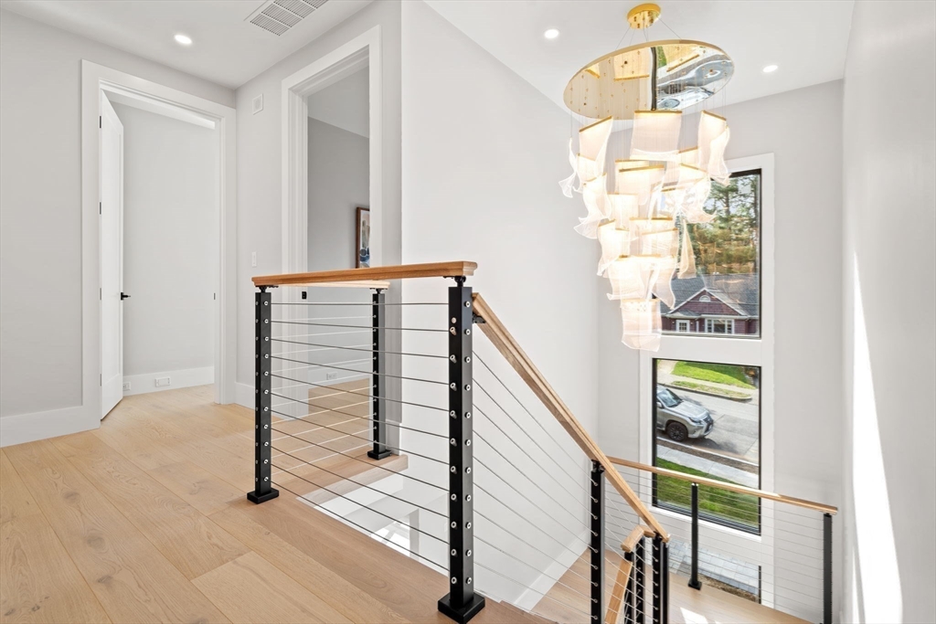 56 Upland Road Newton, MA 02468 - Photo 35 of 41 a view of entryway with wooden floor