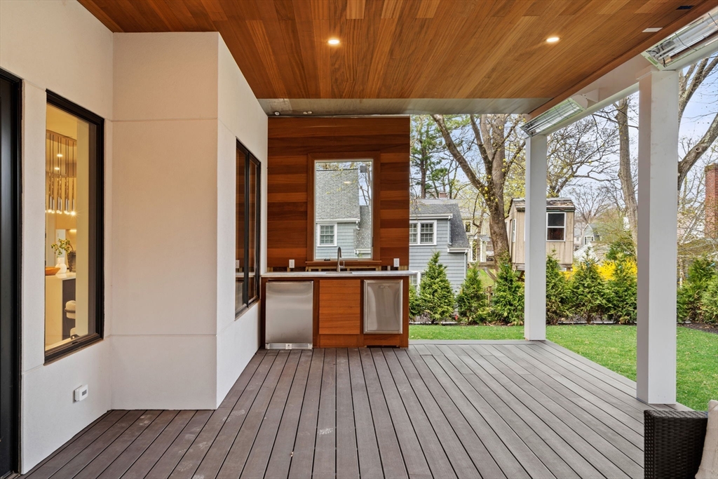 56 Upland Road Newton, MA 02468 - Photo 41 of 41 a view of a house with a patio