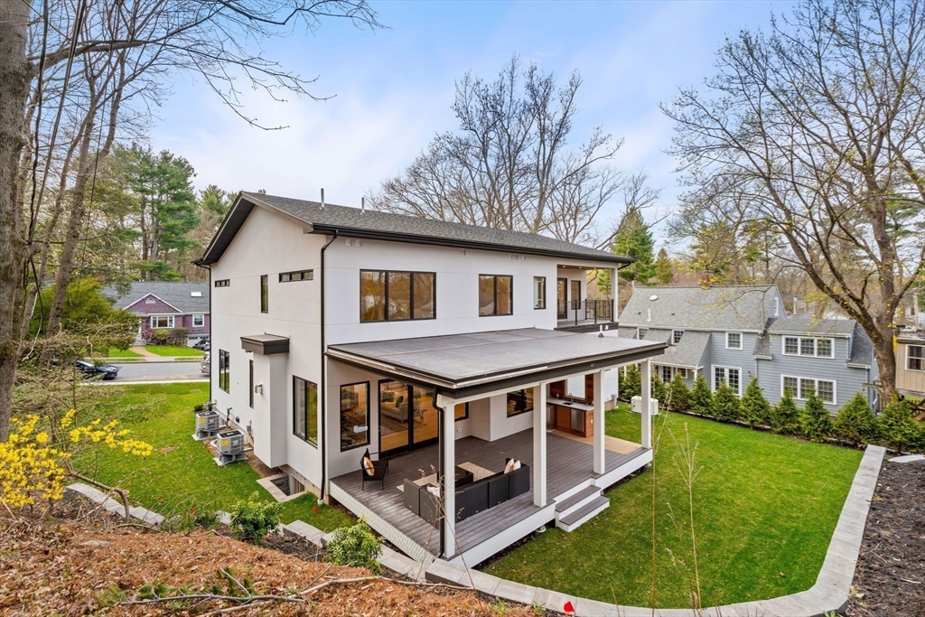 56 Upland Road Newton, MA 02468 - Photo 5 of 41 a house view with a garden space